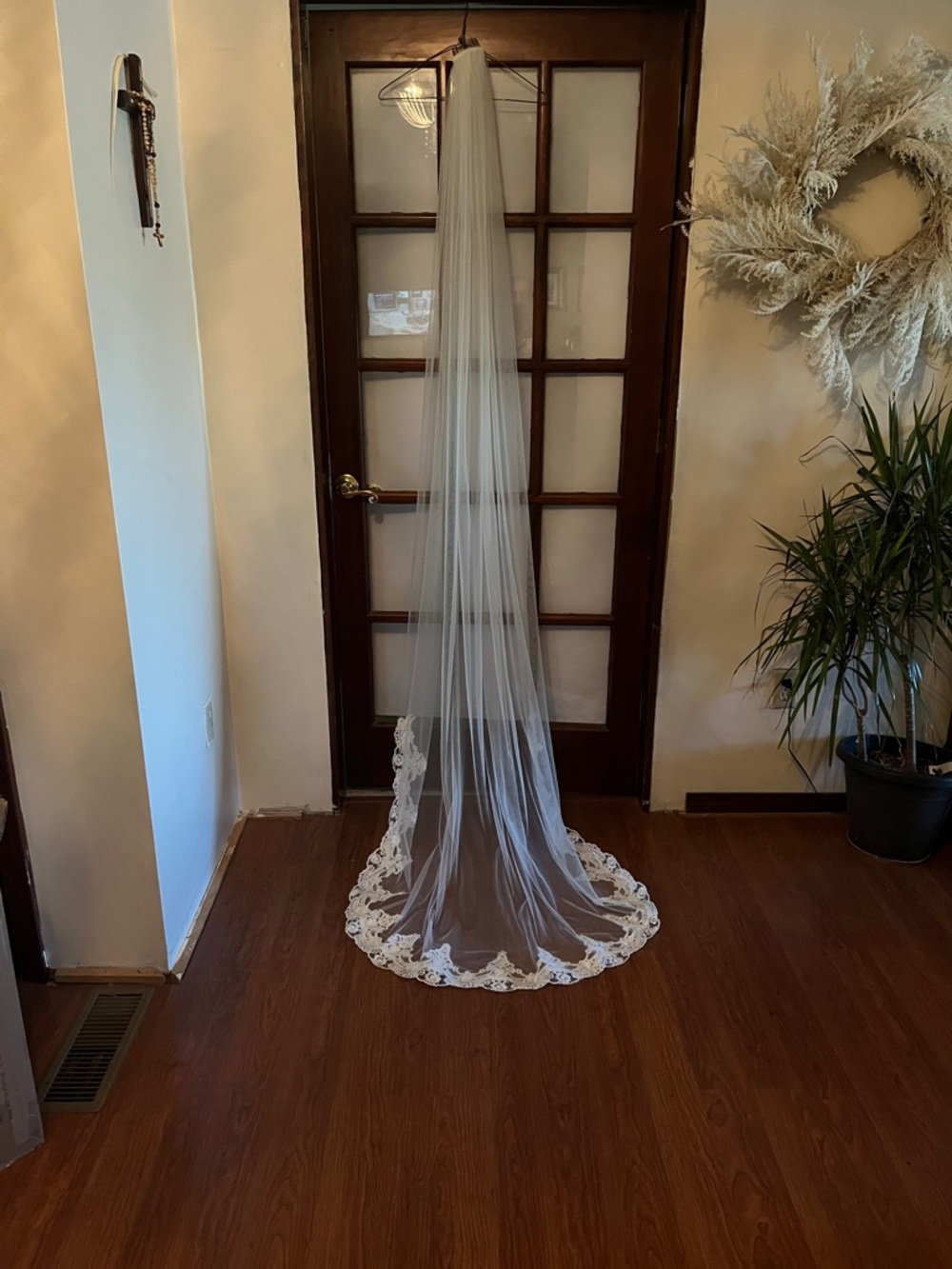 Stunning ivory / white Chapel length veil soft and classy . Beautiful